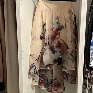 Cream coloured skirt with blue and pink floral print from honey.